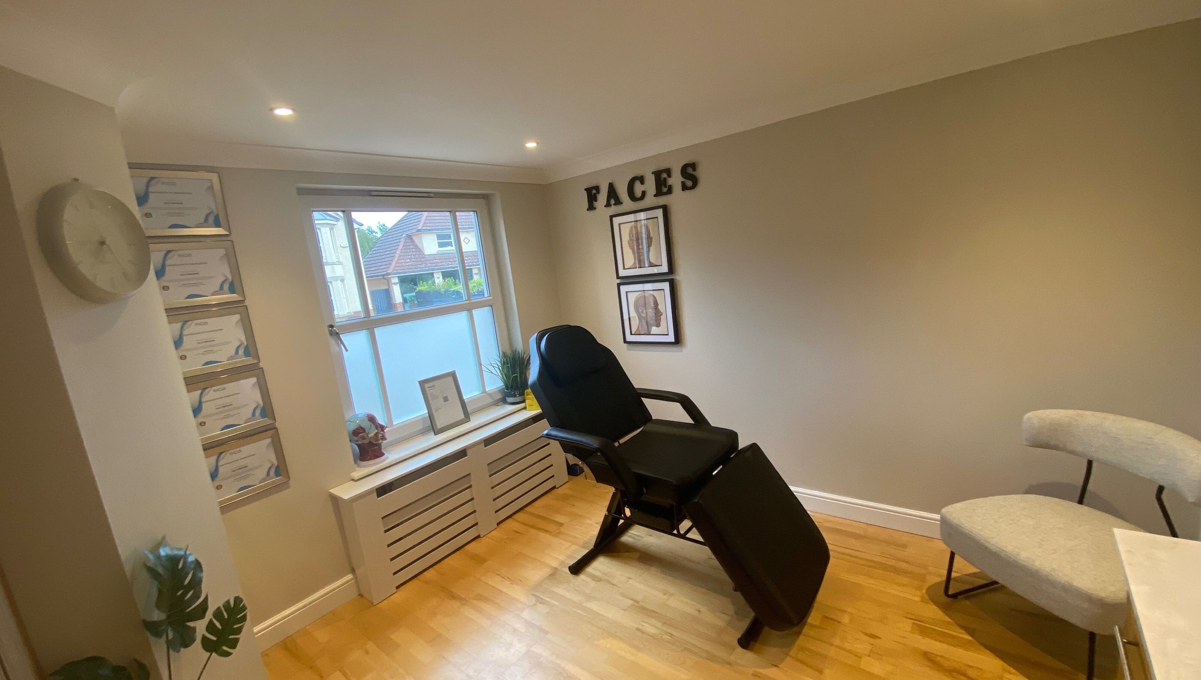 Treatment room in Facial Aesthetics Clinic East Scotland, Dunbar, featuring a reclining chair and soothing decor.