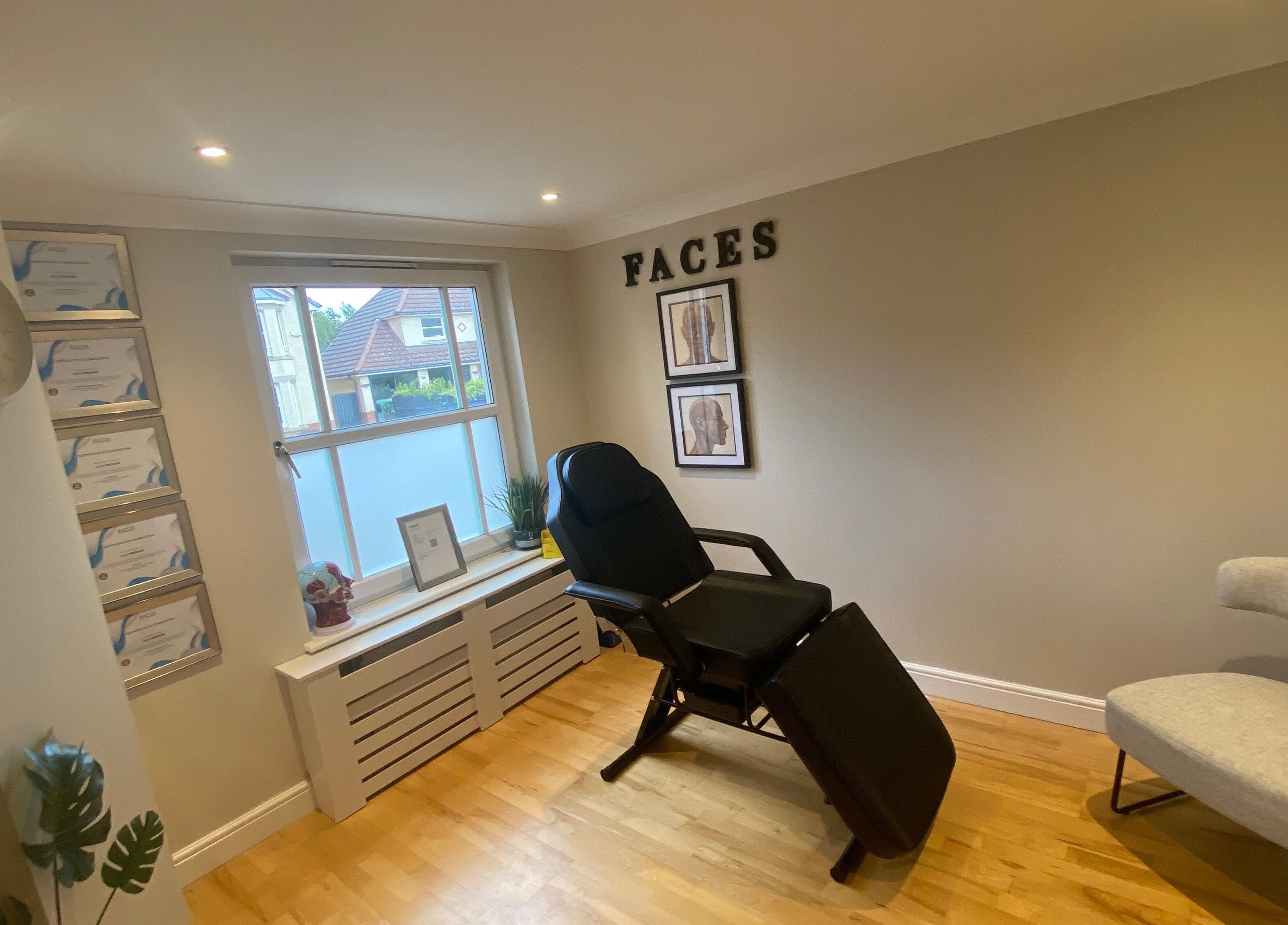 Treatment room in Facial Aesthetics Clinic East Scotland, Dunbar, featuring a reclining chair and soothing decor.