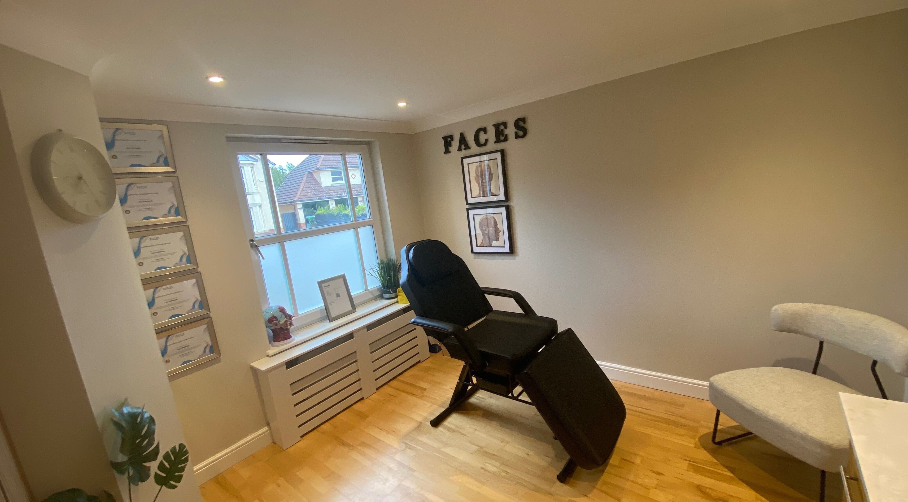 Treatment room in Facial Aesthetics Clinic East Scotland, Dunbar, featuring a reclining chair and soothing decor.
