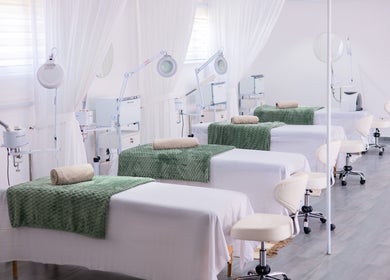 Luxurious facial treatment beds at Micata Facial Bar, Lusaka, Lusaka Province, ZM, with green accents.