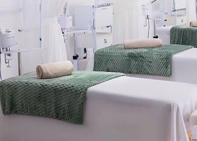 Calm treatment rooms at Micata Facial Bar, Lusaka, Lusaka Province, ZM, featuring elegant green decor.