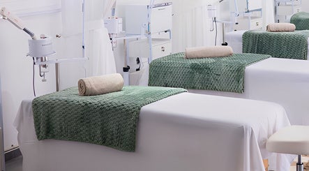 Calm treatment rooms at Micata Facial Bar, Lusaka, Lusaka Province, ZM, featuring elegant green decor.