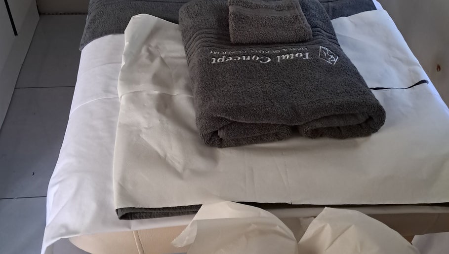 Soft towels on a massage bed at Kayises Beauty and Wellness Spa in East London, Eastern Cape, ZA.