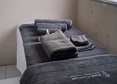 Relaxing massage table at Kayises Beauty and Wellness Spa in East London, Eastern Cape, ZA, ready for clients.
