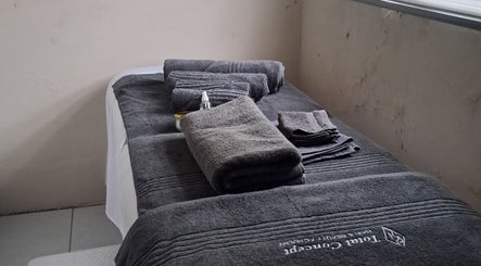 Relaxing massage table at Kayises Beauty and Wellness Spa in East London, Eastern Cape, ZA, ready for clients.