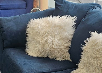 Plush seating with fluffy pillows at Shin Dynasty Nails, Gasparillo, Princes Town Regional Corporation, TT.