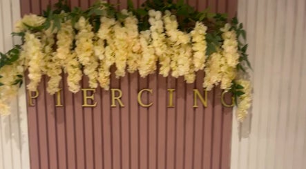 Ethereal Luxury Body Piercing sign adorned with flowers, Kilmarnock, Scotland, GB.
