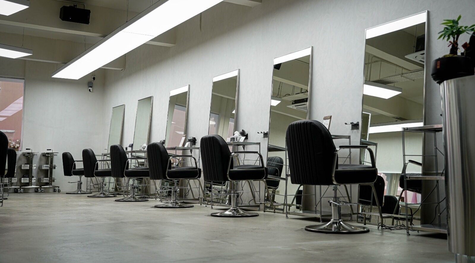 Modern salon chairs and mirrors at Yoje Hair Salon, Kuala Lumpur, Wilayah Persekutuan Kuala Lumpur, MY.