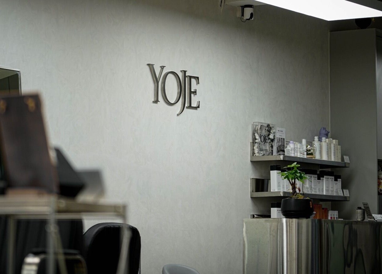 Sleek interior of Yoje Hair Salon in Kuala Lumpur, Wilayah Persekutuan Kuala Lumpur, MY featuring stylish decor.