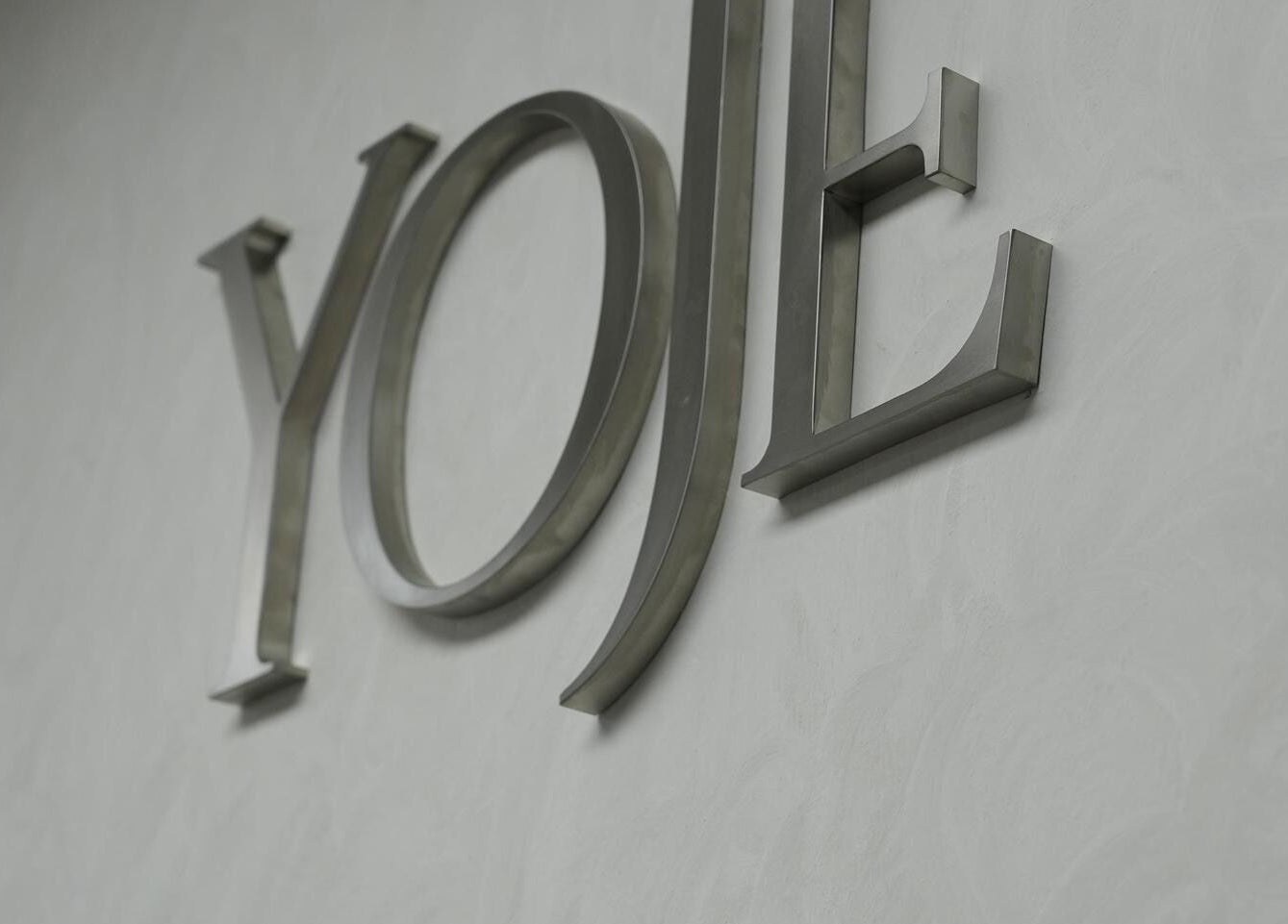 Stylish metallic Yoje Hair Salon sign in Kuala Lumpur, Wilayah Persekutuan Kuala Lumpur, MY.