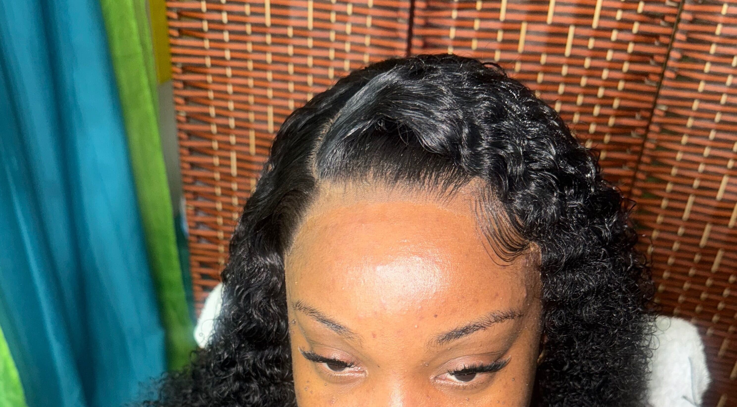 Close-up of styled curly hair at GLOWED BY TAMMY, Roseau, Saint George Parish, DM.