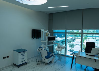 Modern dental room at Boulevard Clinic, Doha, Doha Municipality, QA with professional equipment and serene view.