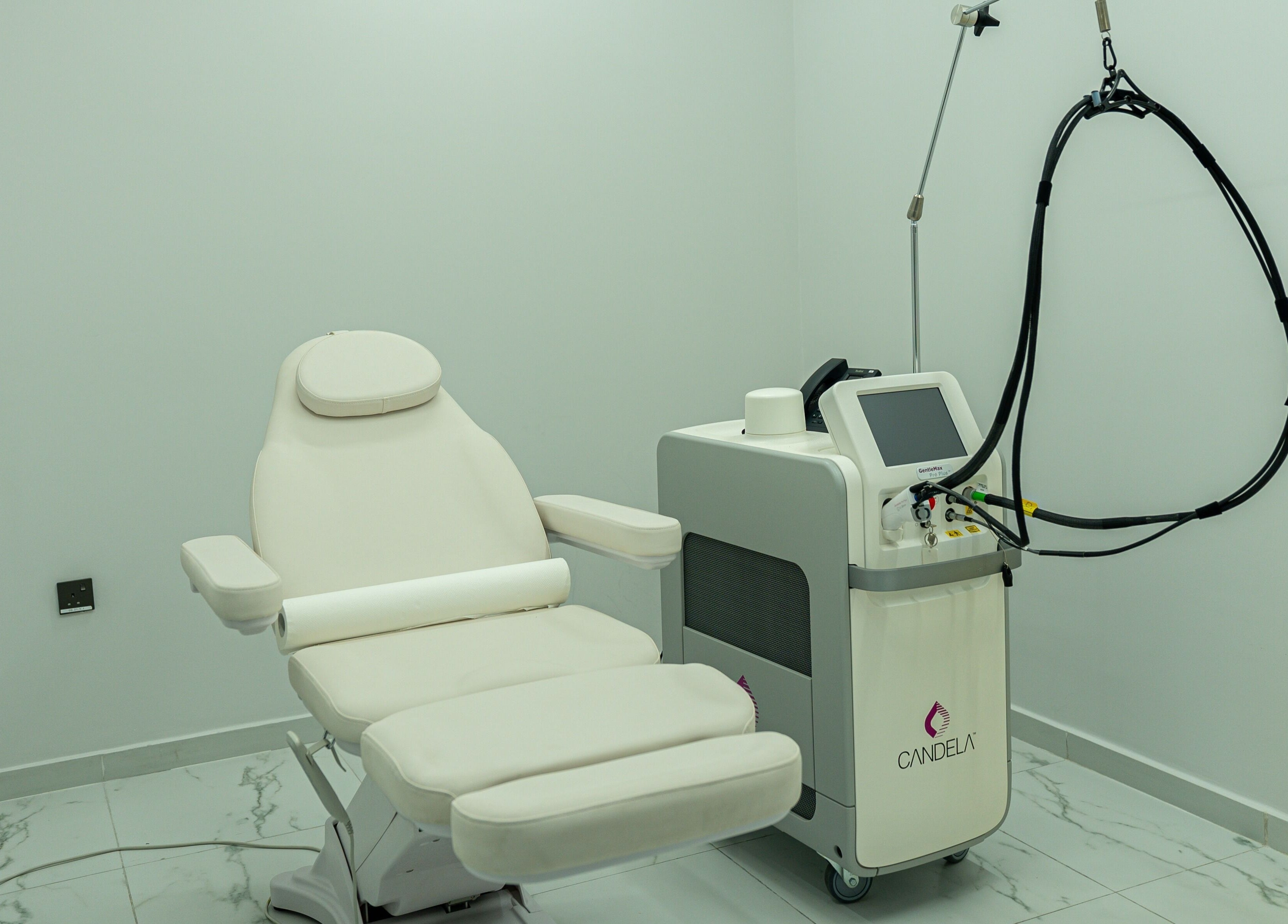 Modern treatment room at Boulevard Clinic, Doha, Doha Municipality, QA, showcasing advanced aesthetic equipment.