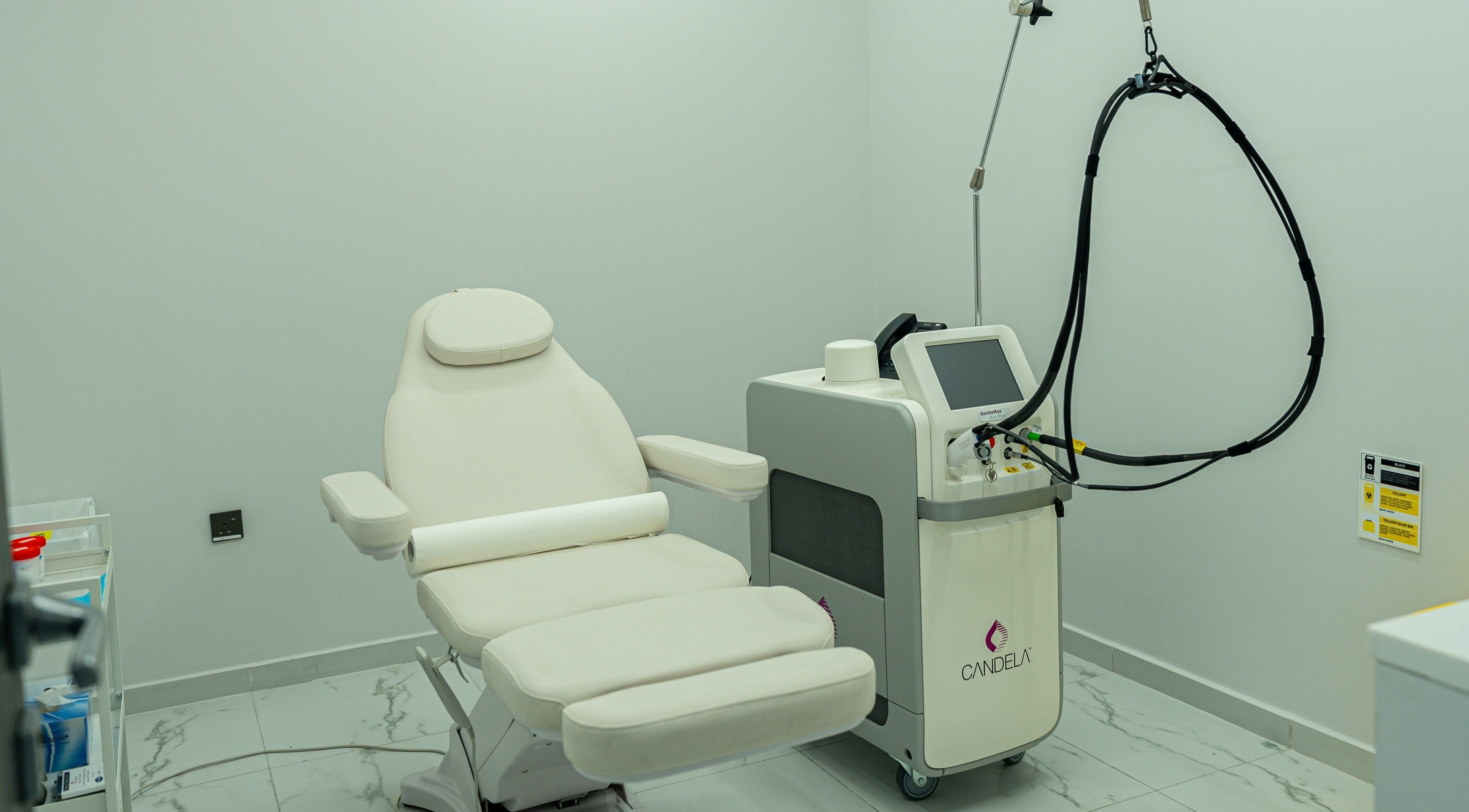 Modern treatment room at Boulevard Clinic, Doha, Doha Municipality, QA, showcasing advanced aesthetic equipment.
