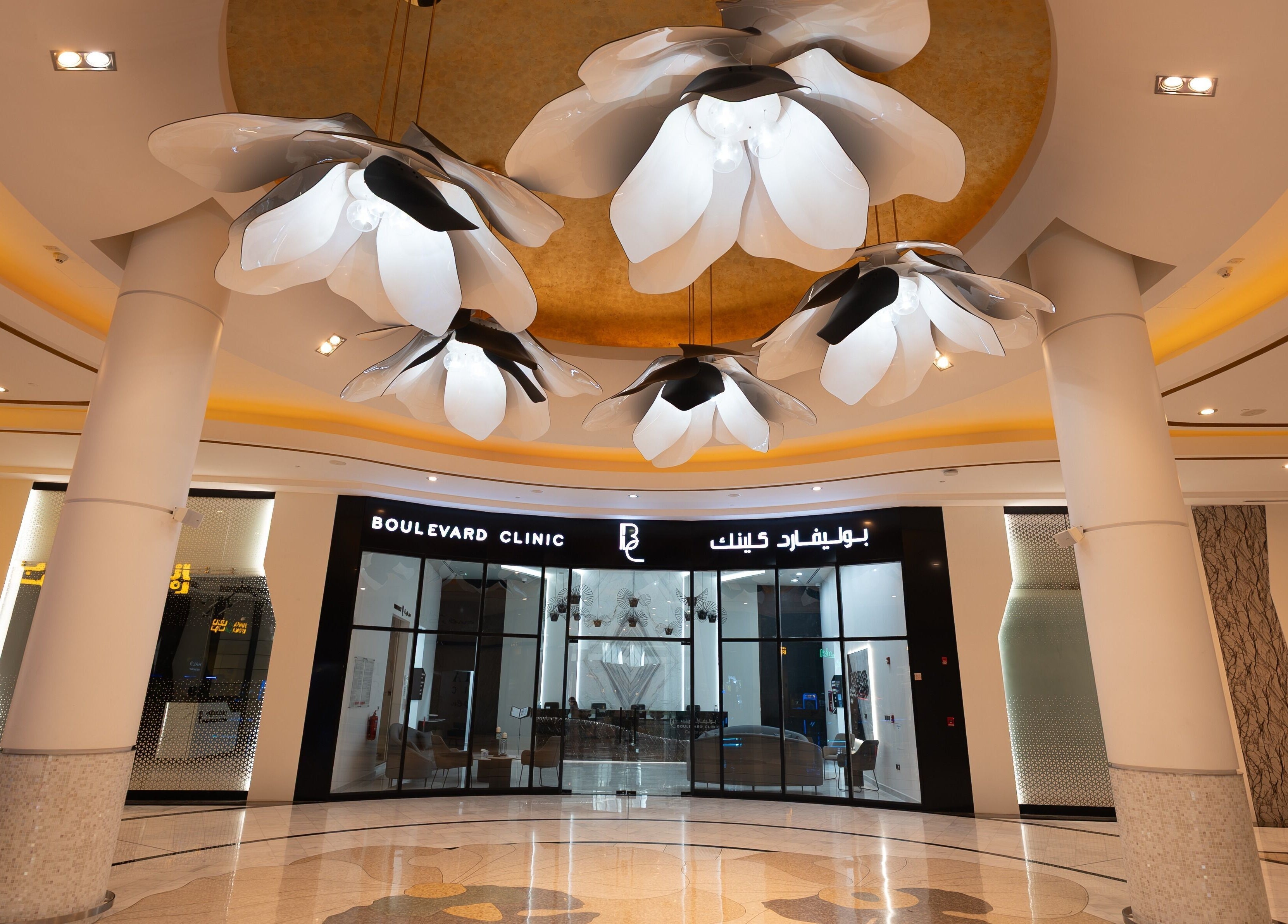 Elegant entrance of Boulevard Clinic in Doha, Doha Municipality, QA with modern lighting fixtures.