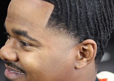Close-up of a stylish haircut at JOSHUA BARBER Cape Town, Western Cape, ZA showcasing expert precision.