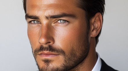 Groomed man at JOSHUA BARBER Cape Town, Western Cape, ZA reflecting modern style and sophistication.