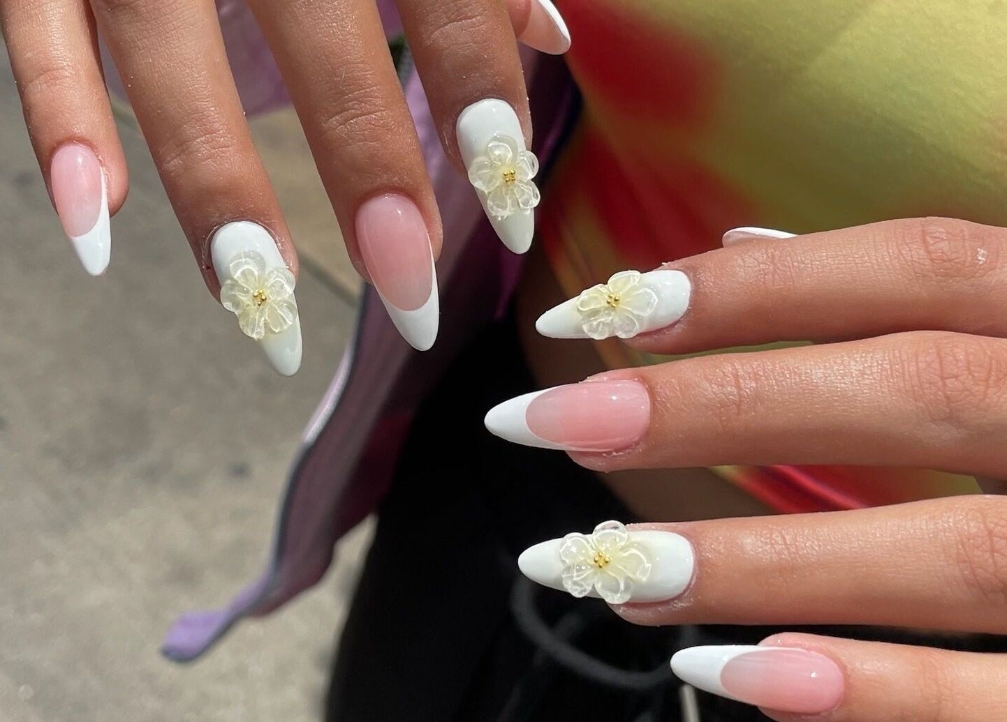 Elegant floral nail art at Nail Haus, Toronto, Ontario, CA showcasing intricate 3D designs.