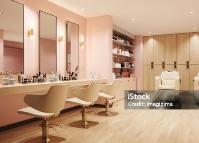 Chic salon interior at House of S, Langemark-poelkapelle, Vlaanderen, BE with modern chairs and beauty products.