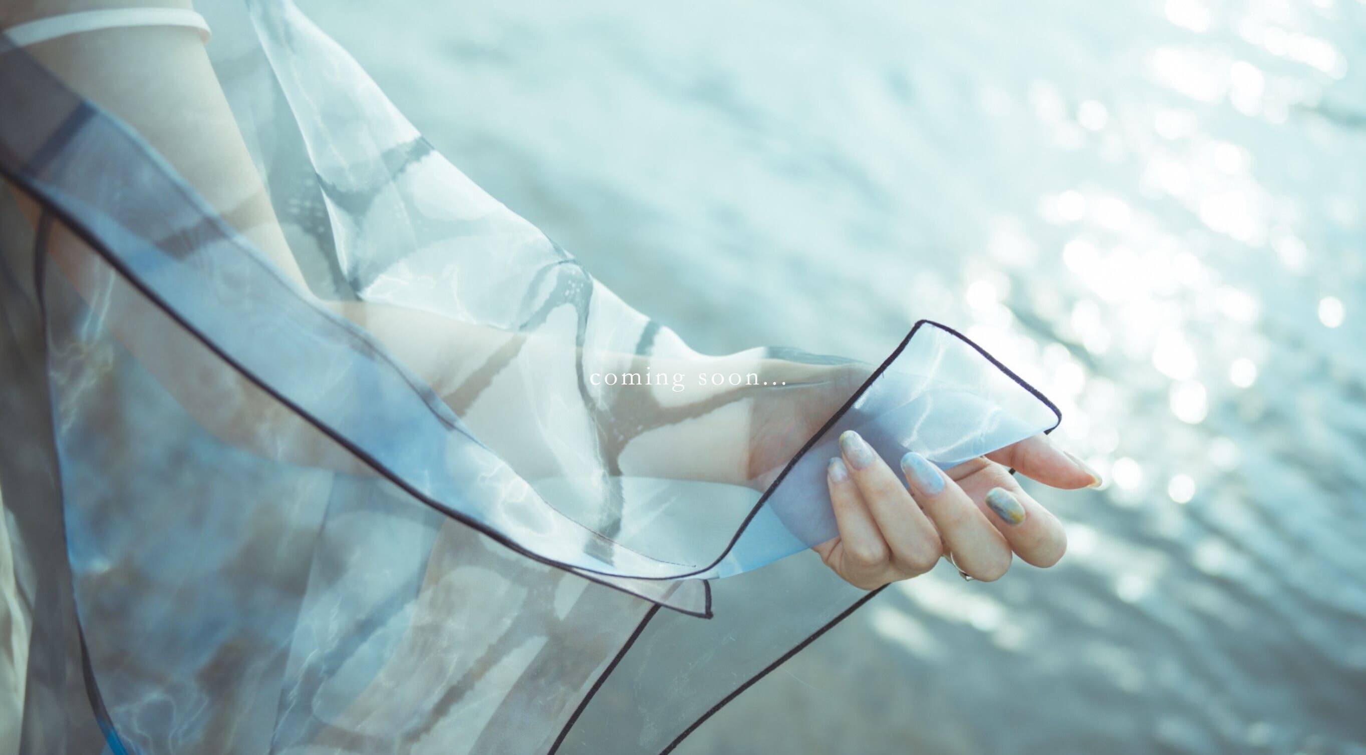 Elegant hand with sheer fabric at SUMU, Düsseldorf, Nordrhein-westfalen, DE.