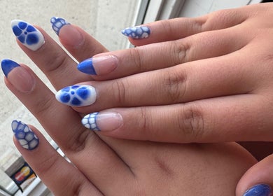 Stylish blue and white nail art at H + E By Jayla P, Weyburn, Saskatchewan, CA.
