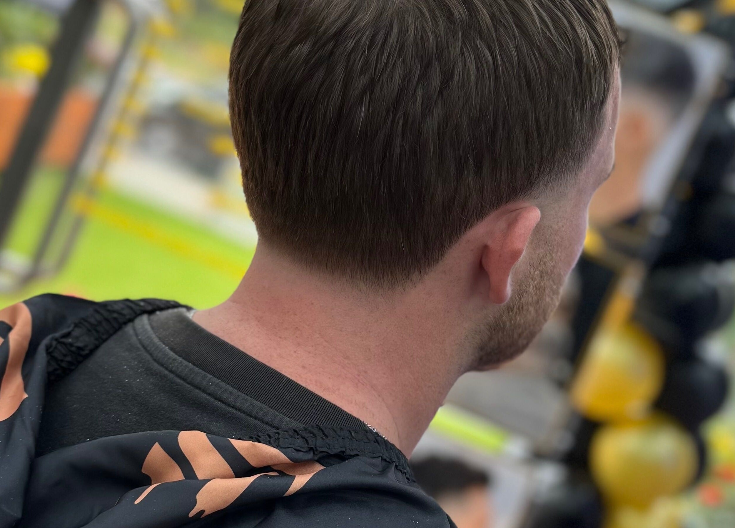 Close-up of a man's fresh haircut at South Fade Barbers, London, England, GB.