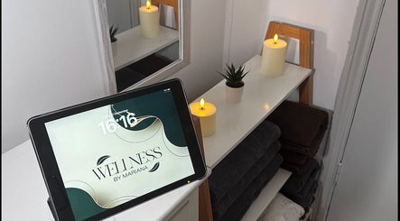 Cozy interior of Wellness by Mariana with candles and towels in Southampton, England, GB.