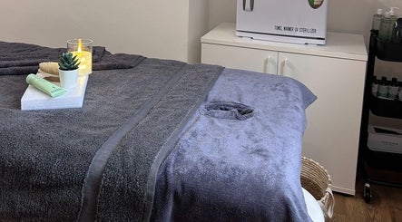 Relaxing spa room setup at Wellness by Mariana, Southampton, England, GB, featuring a treatment bed and soothing decor.