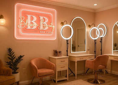 Cozy makeup area at Blossom Beauty, Willemstad, Curaçao, CW with ring lights and plush chairs.