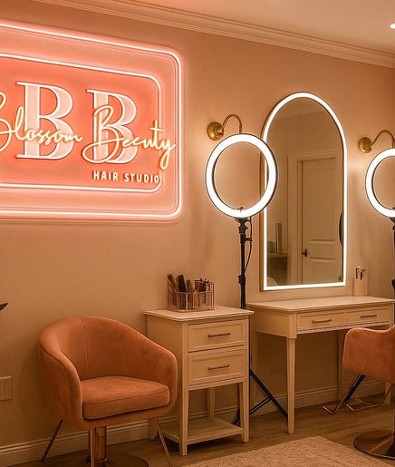 Cozy makeup area at Blossom Beauty, Willemstad, Curaçao, CW with ring lights and plush chairs.
