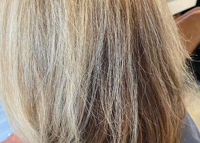 Stylish blonde hairstyle at Hair Junkie, Toowoon Bay, New South Wales, AU.