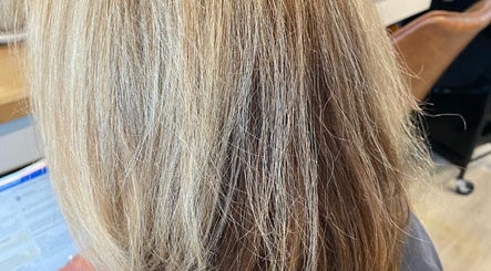 Stylish blonde hairstyle at Hair Junkie, Toowoon Bay, New South Wales, AU.
