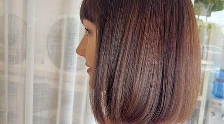 Elegant bob hairstyle at Hair Junkie, Toowoon Bay, New South Wales, AU, showcasing a sleek finish.