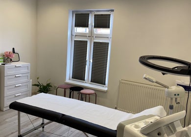 Bright treatment room at my.wax.lab in Long Eaton, England, GB with massage table and modern decor.