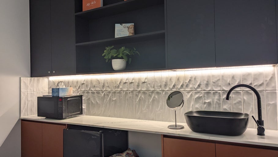 Modern vanity area at Bibi Beauty, Erskineville, NSW, AU, featuring sleek sink and elegant decor.
