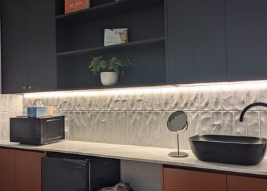 Modern vanity area at Bibi Beauty, Erskineville, NSW, AU, featuring sleek sink and elegant decor.