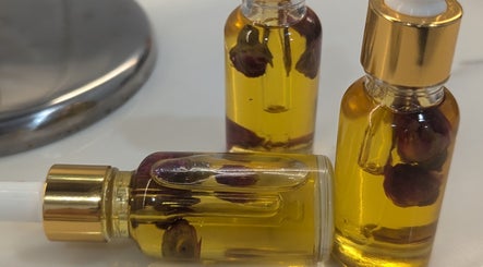 Bibi Beauty's floral oil bottles in Erskineville, New South Wales, AU, showcasing luxury wellness.