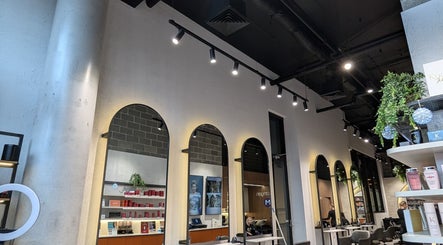 Interior of Bibi Beauty, Erskineville, New South Wales, AU with stylish mirrors and elegant lighting.