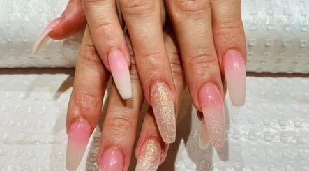 Elegant pink glitter acrylic nails at M&P Nail Salon in Hallett Cove, South Australia, AU.