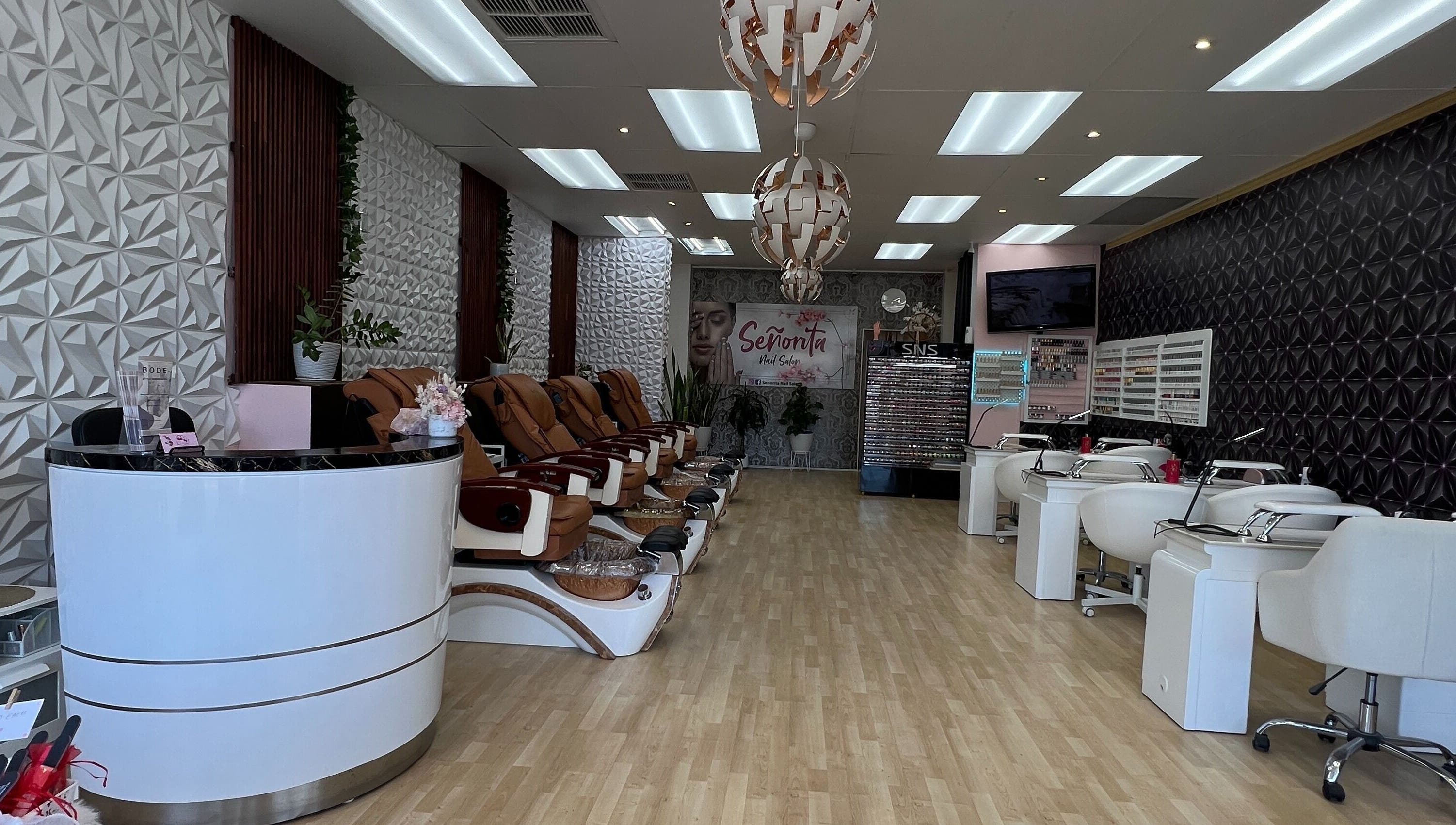 Interior of Senorita Nails salon in Parkside, South Australia, featuring stylish chairs and modern decor.