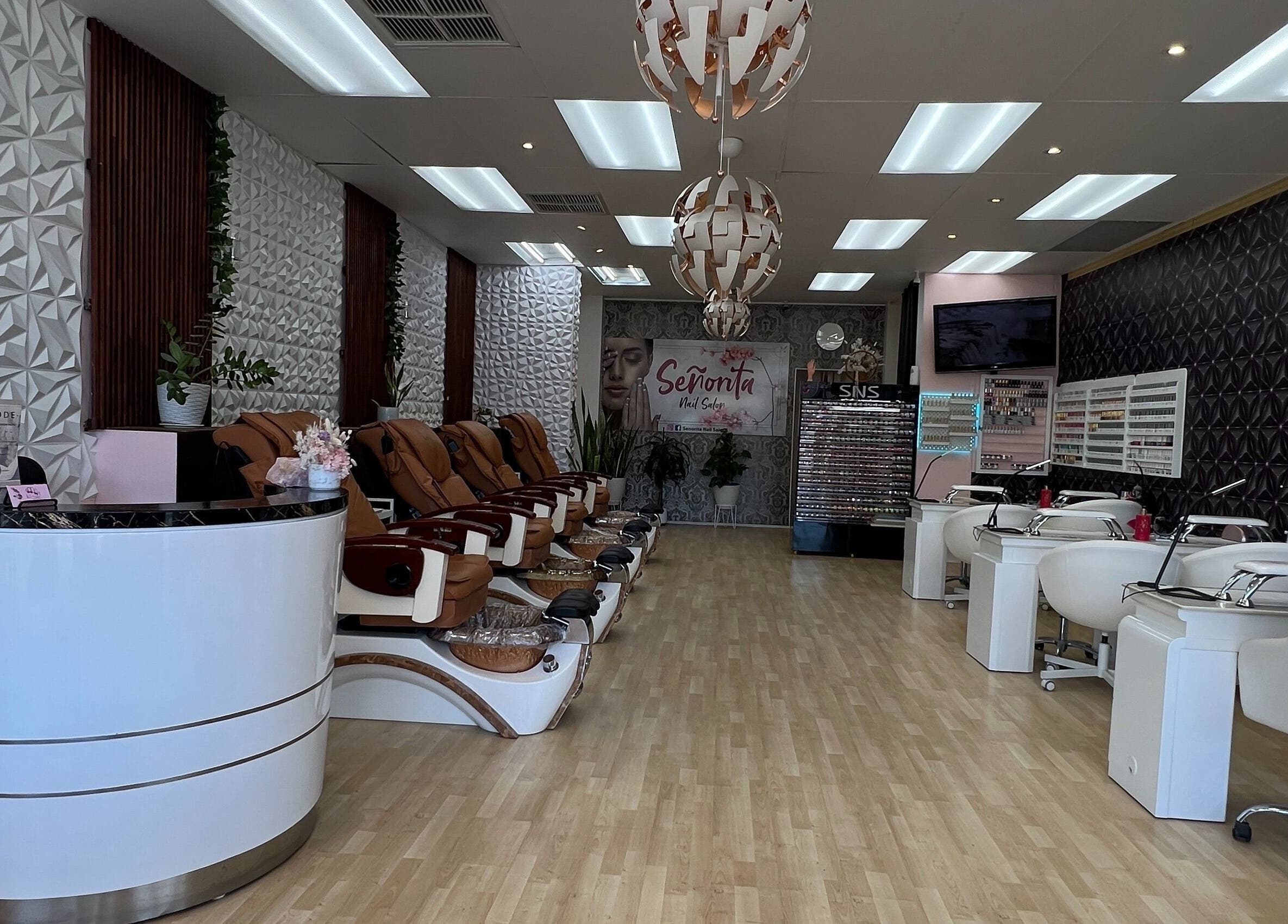Interior of Senorita Nails salon in Parkside, South Australia, featuring stylish chairs and modern decor.
