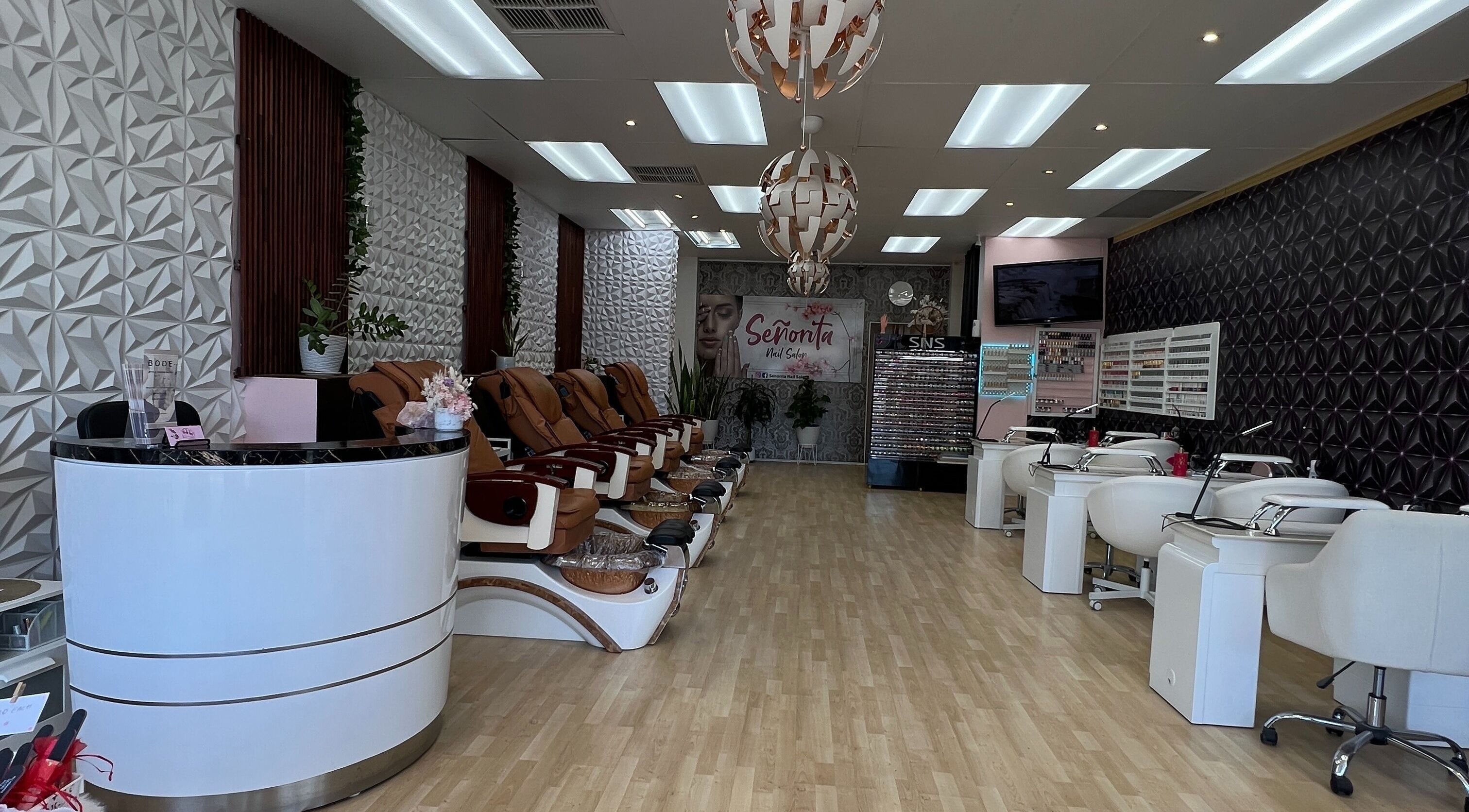 Interior of Senorita Nails salon in Parkside, South Australia, featuring stylish chairs and modern decor.