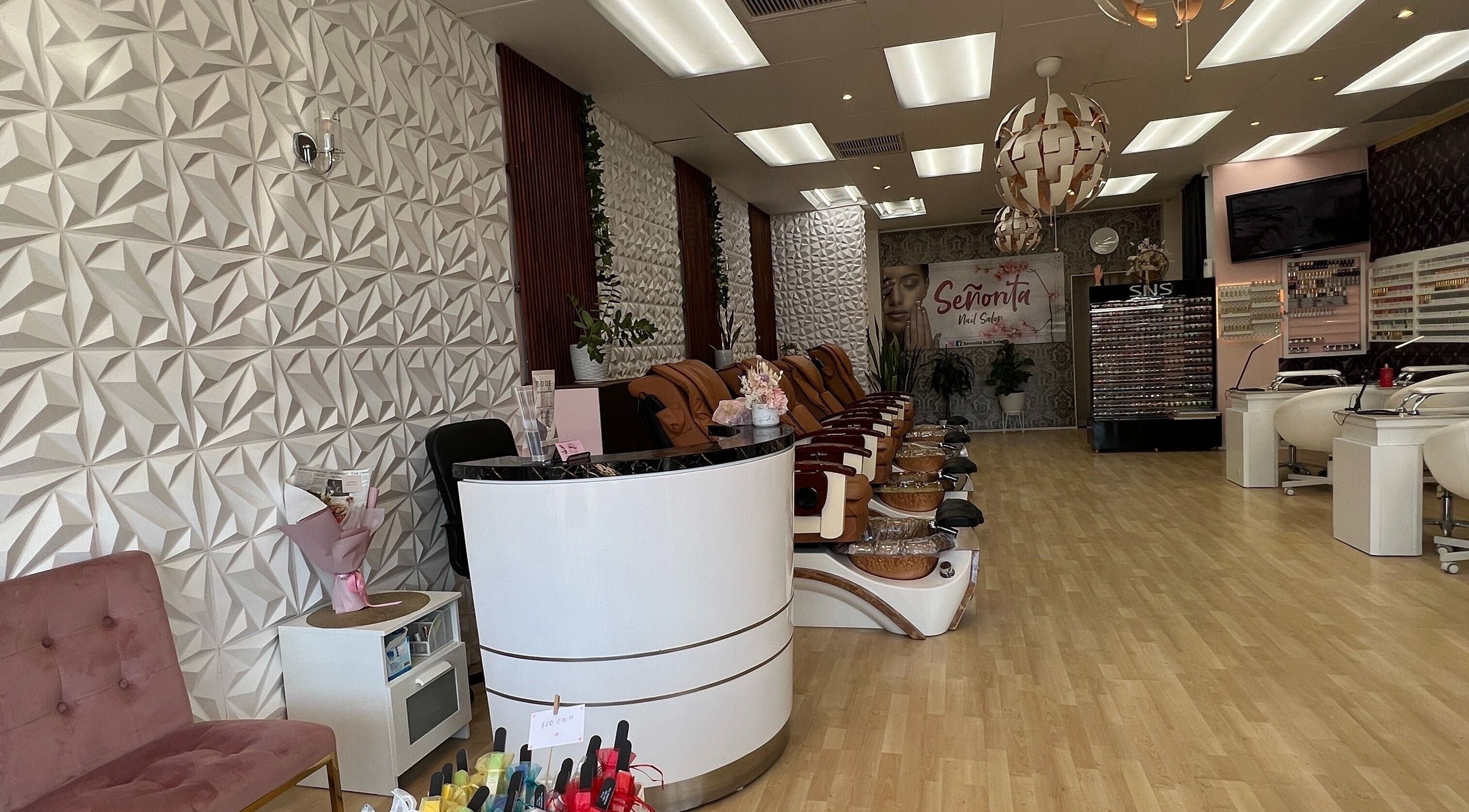 Interior of Senorita Nails salon in Parkside, South Australia, AU showcasing chic nail stations and modern decor.