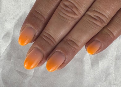 Vibrant sunset gradient nails by Nail Studio By M.C in Ombrée D'anjou, Pays De La Loire, FR.