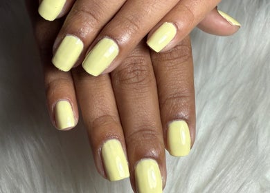 Bright yellow manicured nails at Valentina Rivera, Ħal Tarxien, MT, embodying chic style and neat design.