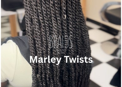 Marley twists hairstyle at Braidsbyvuyo - Natural Hair Salon, Sandton, Gauteng, ZA. A showcase of intricate styling.