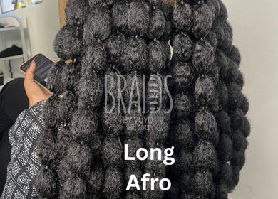 Intricate long afro braids at Braidsbyvuyo - Natural Hair Salon in Sandton, Gauteng, ZA.