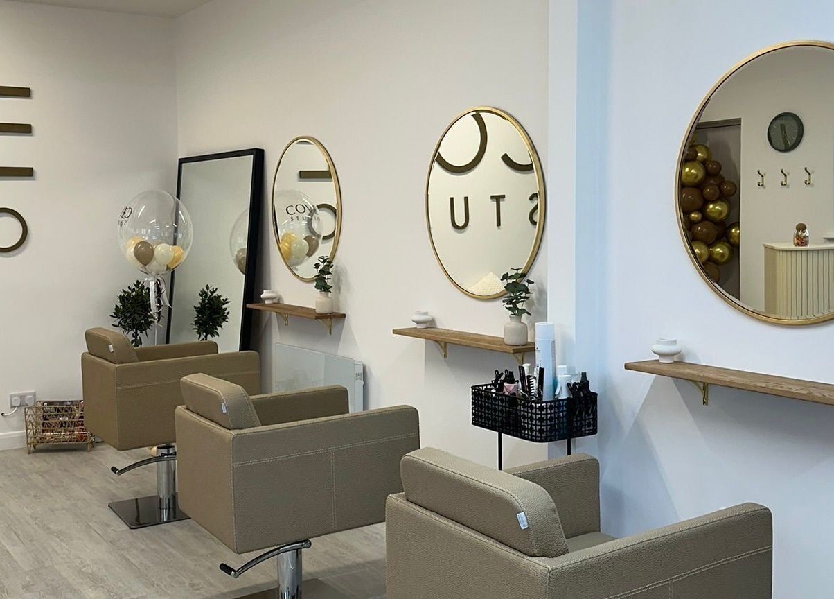 Interior of Grace Sadler Hair in Broughton Astley, England, GB. Features stylish salon chairs and modern decor.