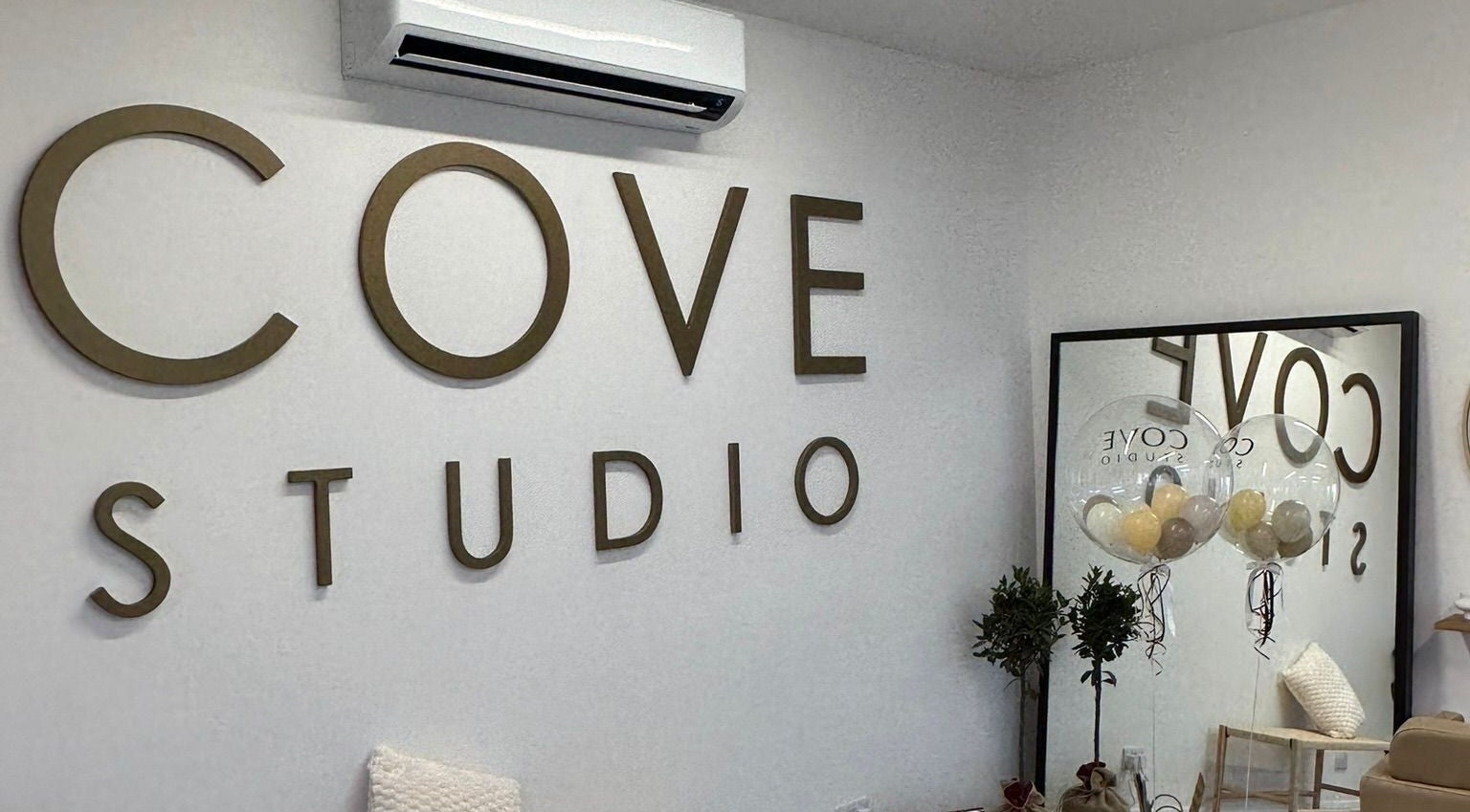 Chic interior of Grace Sadler Hair in Broughton Astley, England, GB, featuring stylish decor and mirror reflection.