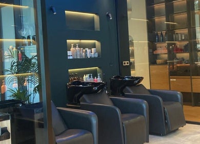 Elegant hair washing area at Story 92 House of Beauty, Dubai, Dubai, AE, featuring sleek design and luxury products.